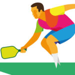Man hitting a pickleball shot