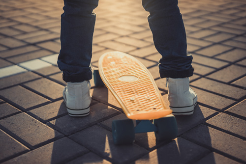 penny board at sunset