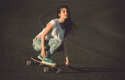 woman longboarding