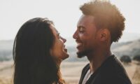man and woman facing