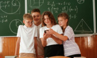 watching fun content on smartphone pupils kids i 2025 03 18 20 15 44 utc