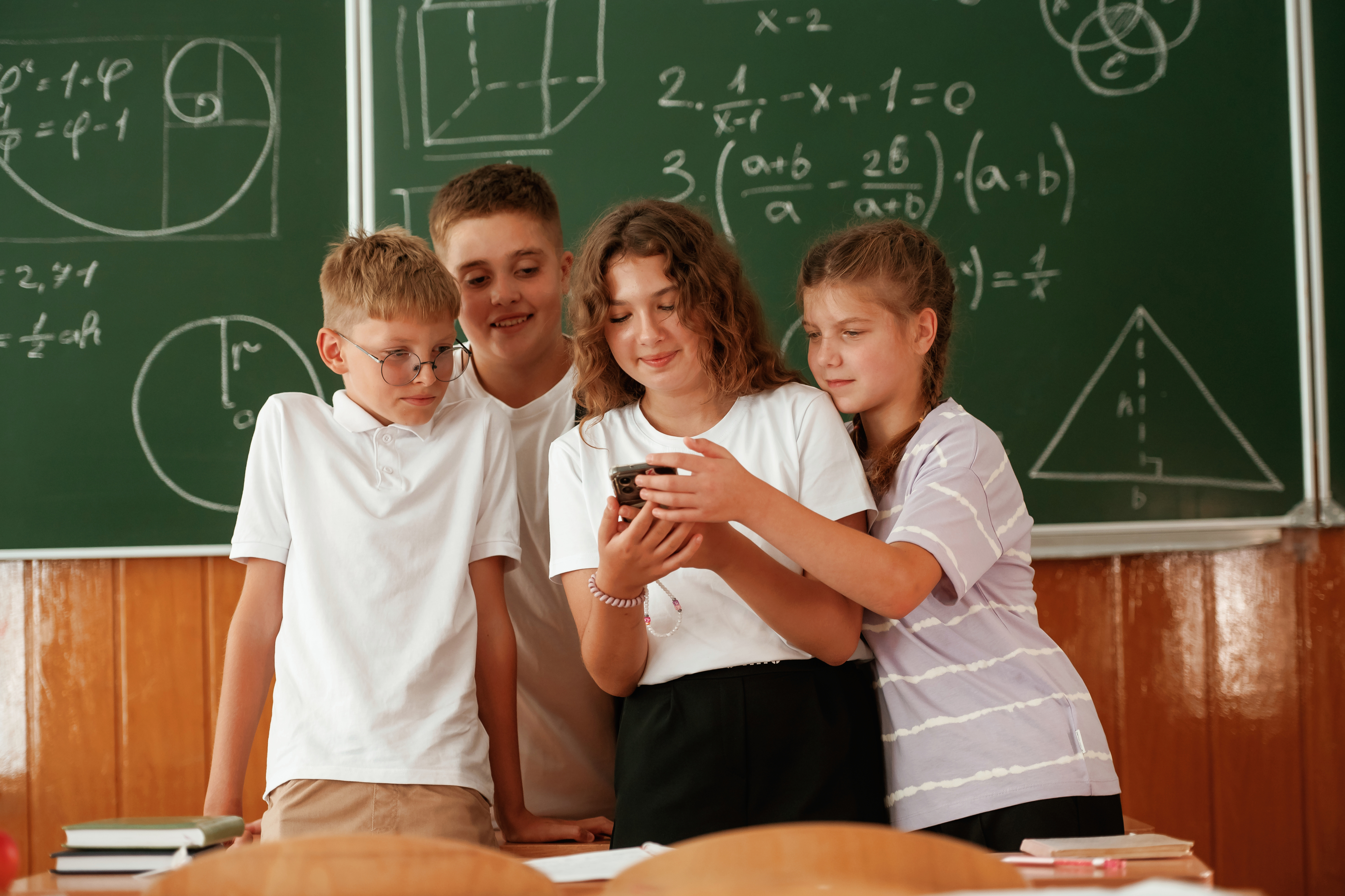 watching fun content on smartphone pupils kids i 2025 03 18 20 15 44 utc