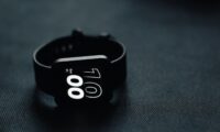 a close up of a watch on a table